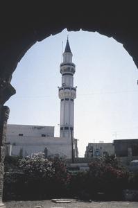 Minaret of Gurgi Mosque Seen Through Roman Arch of Marcus Aurelius (Circa 200 A.D.)