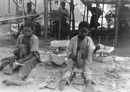 Fulbe Boys Preparing Cotton Thread Spindles for Weavers