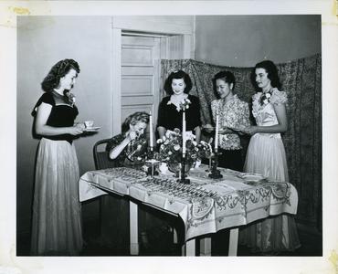 Mrs. LaPointe serving tea to female students
