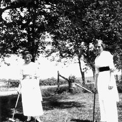 Frances and Helen Healy playing croquet
