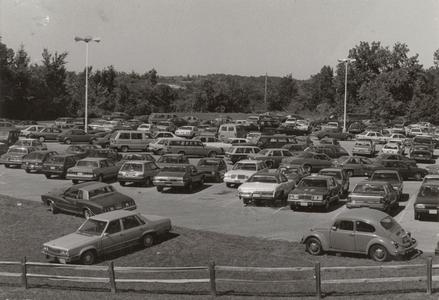 Lower level parking lot full of cars