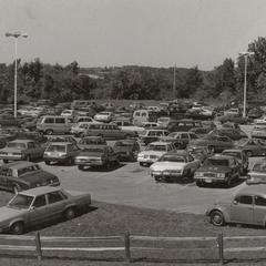 Lower level parking lot full of cars