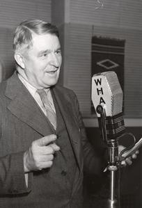 George Briggs at the microphone
