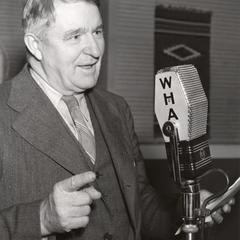 George Briggs at the microphone