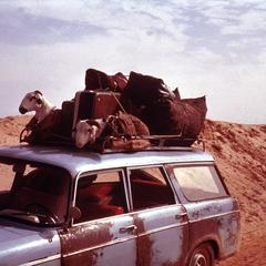 Peugeot Station Wagon Taxi with Sheep and Luggage on Rooftop