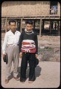 Two Hmong (Meo) men (one in Hmong (Meo) dress)