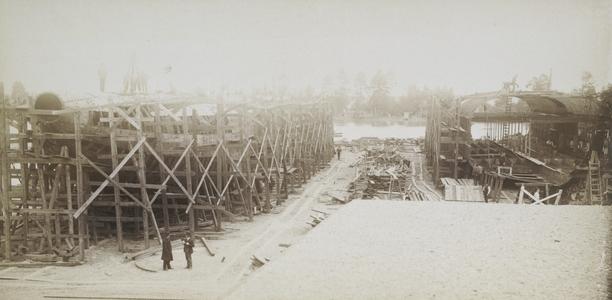 Shipyard with two whalebacks under construction