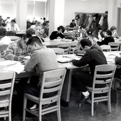 Students study in Commerce building
