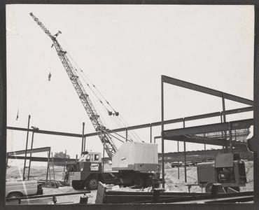 A crane installing framework for a future UW-Washington County building