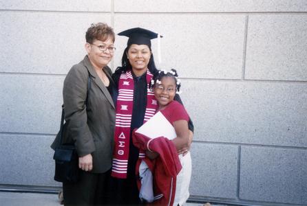A student and family members at 2002 graduation