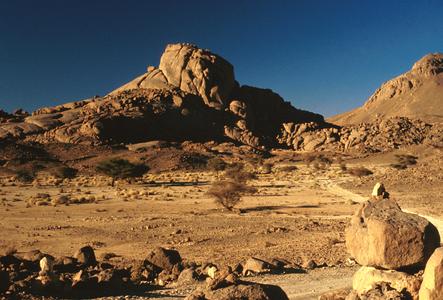 Desert Road View near Ahaggar (Hoggar) Mountains