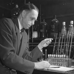Conrad A. Elvehjem engaged in laboratory research