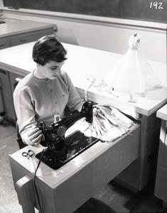 Working at a sewing machine