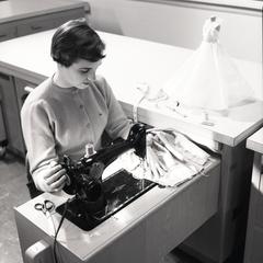 Working at a sewing machine
