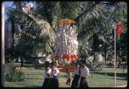 Procession marking end of Buddhist Lent--money tree