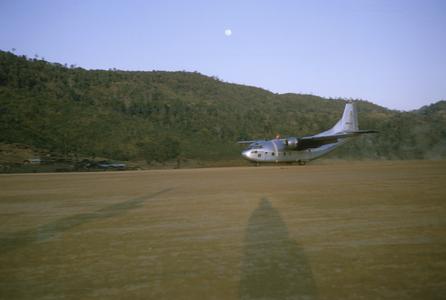 Airplane landing at airstrip