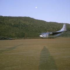 Airplane landing at airstrip