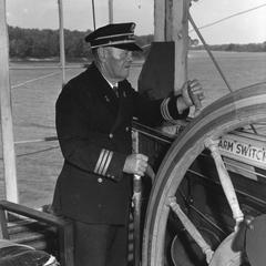 The captain at the wheel of the Idlewild