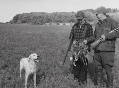 Dan Trainer and Dr. Mueller pheasant hunting