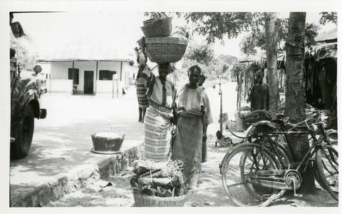 Women with baskets for market