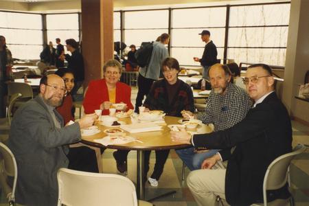 Faculty and staff eating lunch in cafeteria