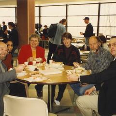 Faculty and staff eating lunch in cafeteria