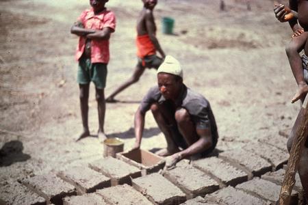 Men Molding Bricks