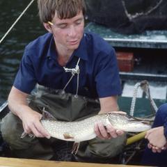 Peter Inskip measuring a northern pike