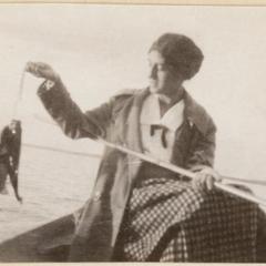 Wife Estella fishing from boat, Fish Lake, Dane County, Wisconsin, July 1925