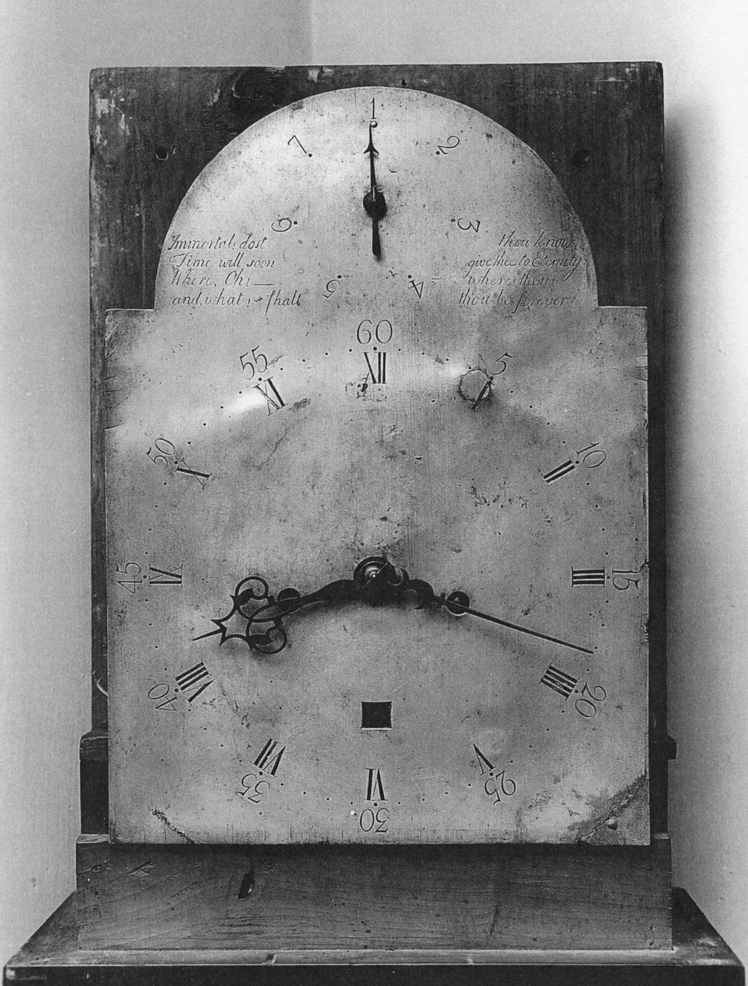 Black and white photograph of an eight-day, strike and repeater clock.