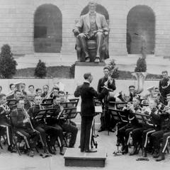 Band directed by E.W. Morphy in concert by Lincoln statue