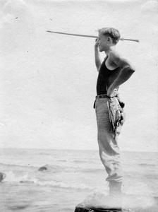 Aldo Leopold at Lake Huron with spear