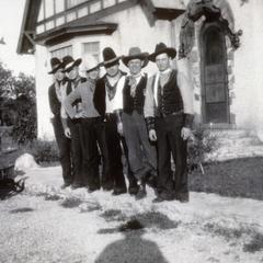 Tony Groeschl Band members pose in cowboy dress
