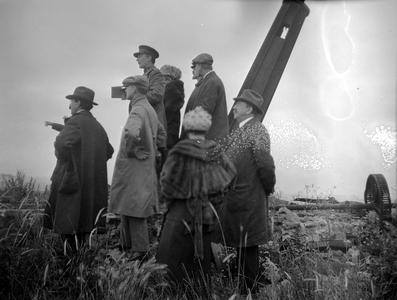 People looking at World War I battlefield