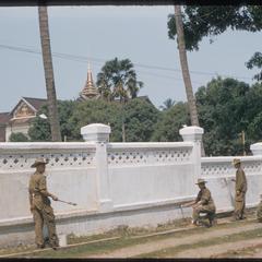 Soldiers painting palace wall