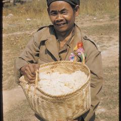Man with rice and basket