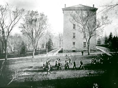 Military drill in front of South Hall