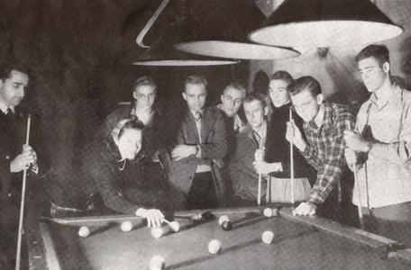 Students playing billiards or pool