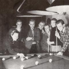 Students playing billiards or pool