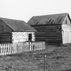 Hog barn (foreground)