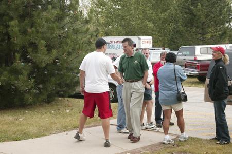 Chancellor Bruce Shepard greeting student during student move-in day