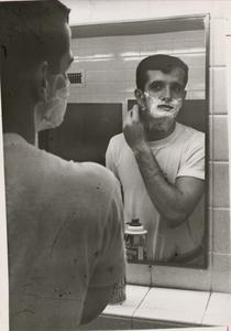 Shaving in mirror