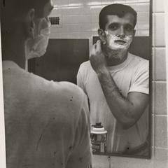 Shaving in mirror