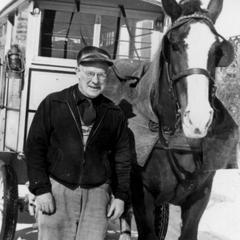 Clifford Noll Sr with milk wagon