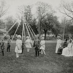 Maypole dance on front lawn of Old Main