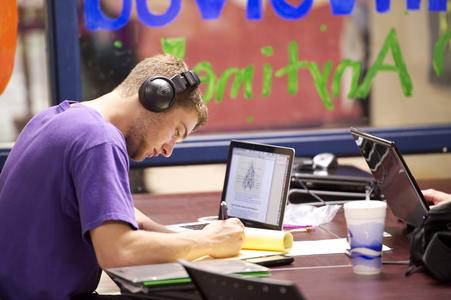Student studies on laptop in the Diversity Center