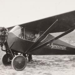 Side view of Monocoupe airplane at Pennco Field, Madison