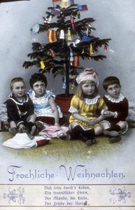 German-American postcard with children seated under a decorated Christmas tree