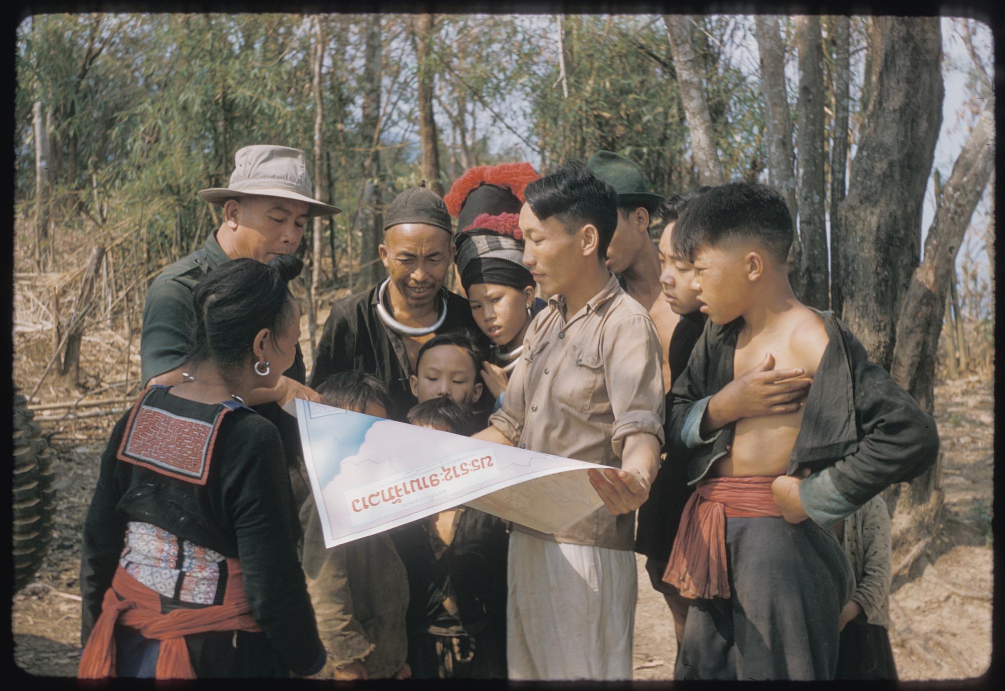 Hmong (Meo) and Inspector of Education with map