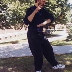 Philosophy professor Mark Peterson practicing Tai Chi